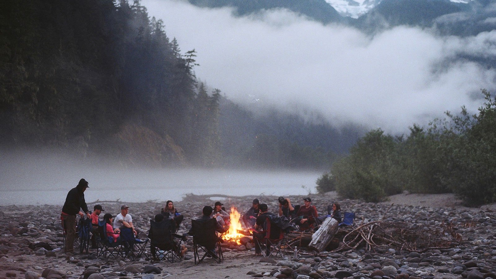 Group at bonfire during Wallop's 15th Anniversary Trip