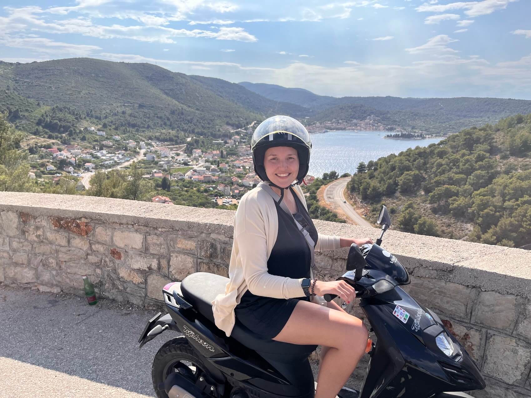 Andreanna on a scooter in Croatia.