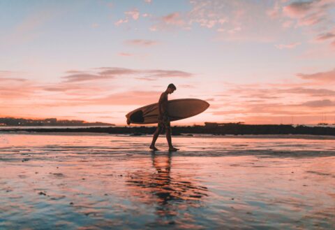 Surfer on beach